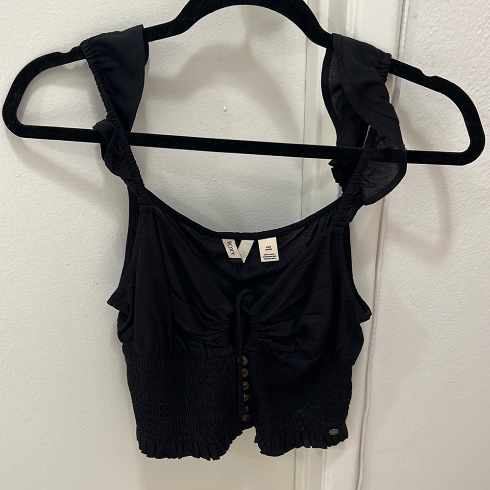 Black, Roxy, ruffle with buttons top. Never worn, brand new.